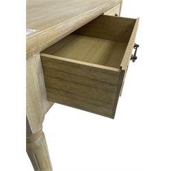 Two-drawer side table, moulded rectangular top over two drawers, on turned and fluted supports; together with a folding side chair with cane seat and back 