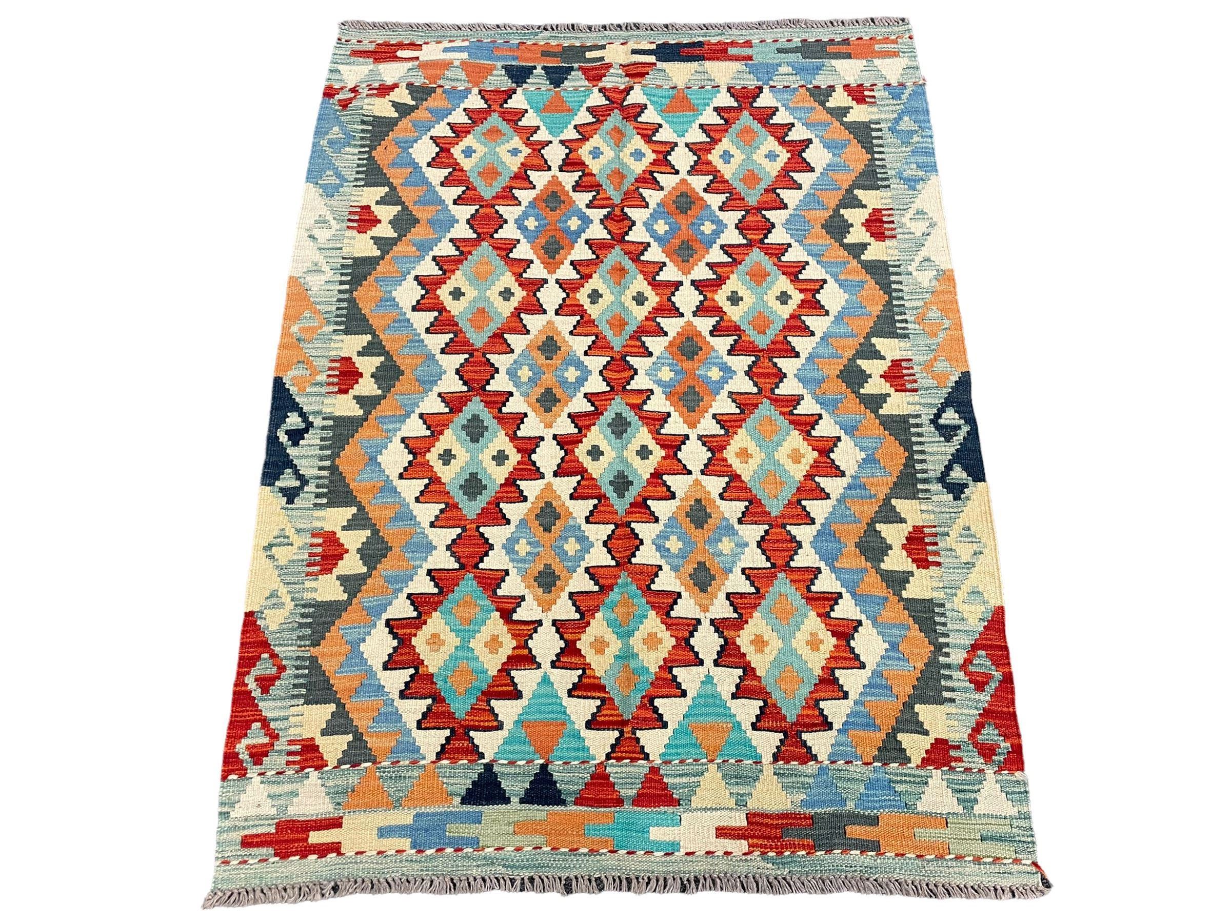 Chobi kilim rug, multicolour ground, the field decorated with stepped