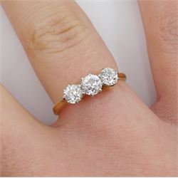 Gold three stone diamond ring, stamped 18ct & Plat, total diamond weight approx 0.60 carat