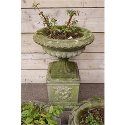  Composite stone circular garden urn, with lobed body on wreath moulded pedestal, H78cm, and a pair of composite stone basket weave oval planters, W51cm, (4)   