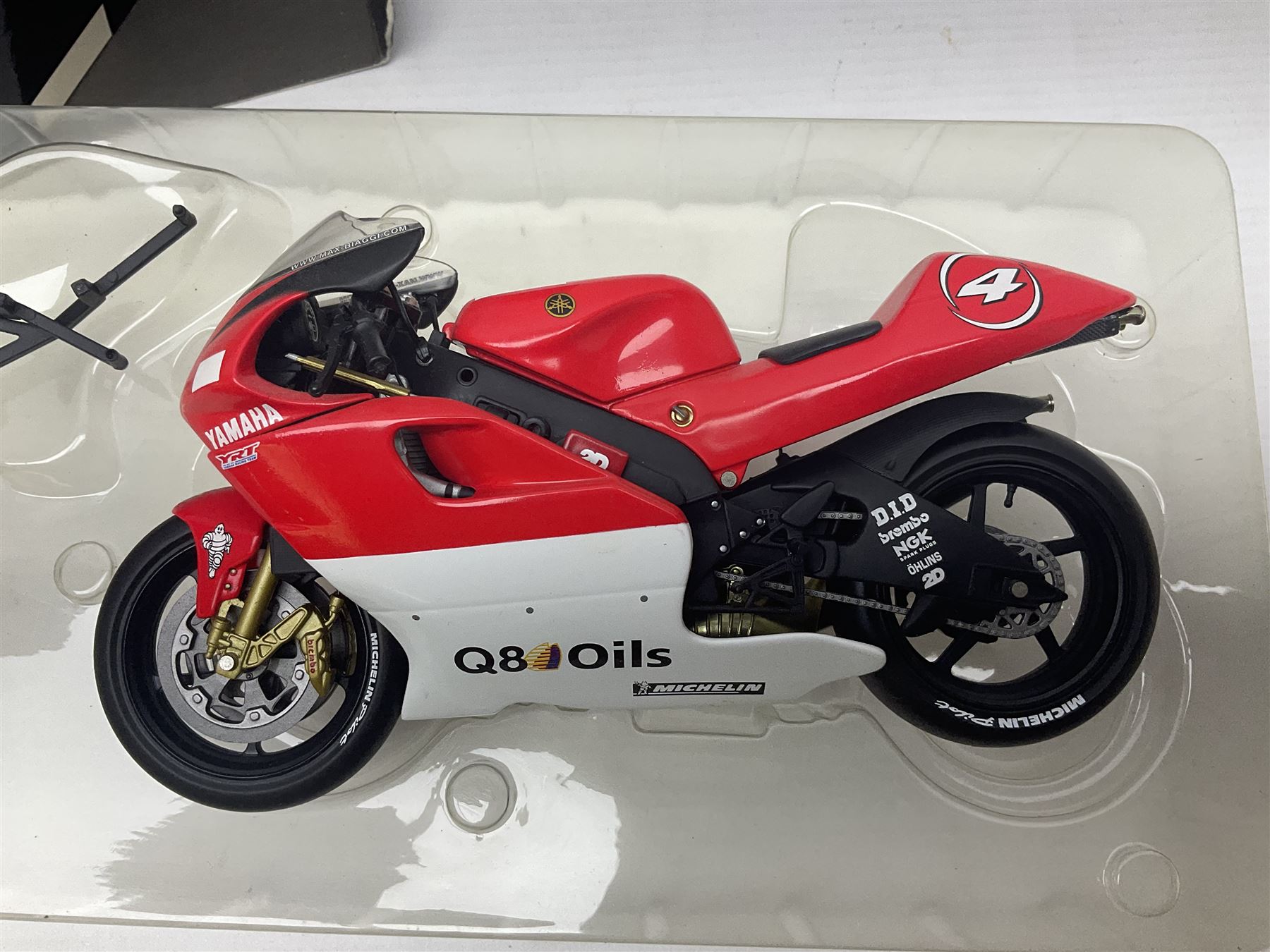 Three Minichamps 1:12 scale die-cast motorcycles - Yamaha YZR 500 Max Biaggi 2000; Yamaha YZR-M1 Colin Edwards Fiat Yamaha Team MotoGP 2007 GP Australia; and Yamaha YZR 500Team Yamaha Max Biaggi 500ccGP 2001; all boxed (3)