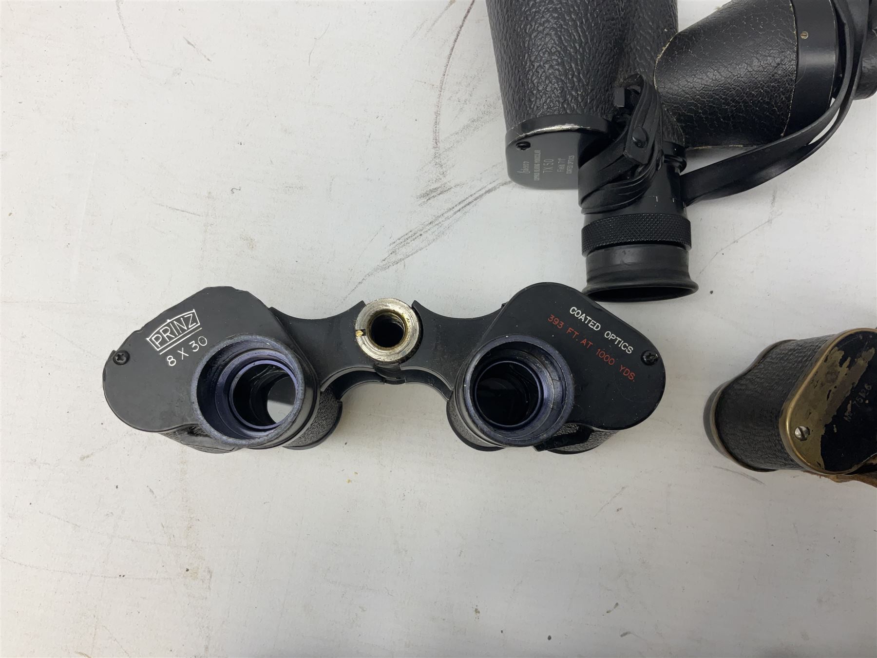 Quantity of binoculars for spares and repair, to include Cogswell & Harrison Primic 8x30, Prinz 8x30, Telstar 35x60, Zeiss Wetzland 8x40 etc