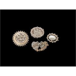 Victorian silver brooches, including one