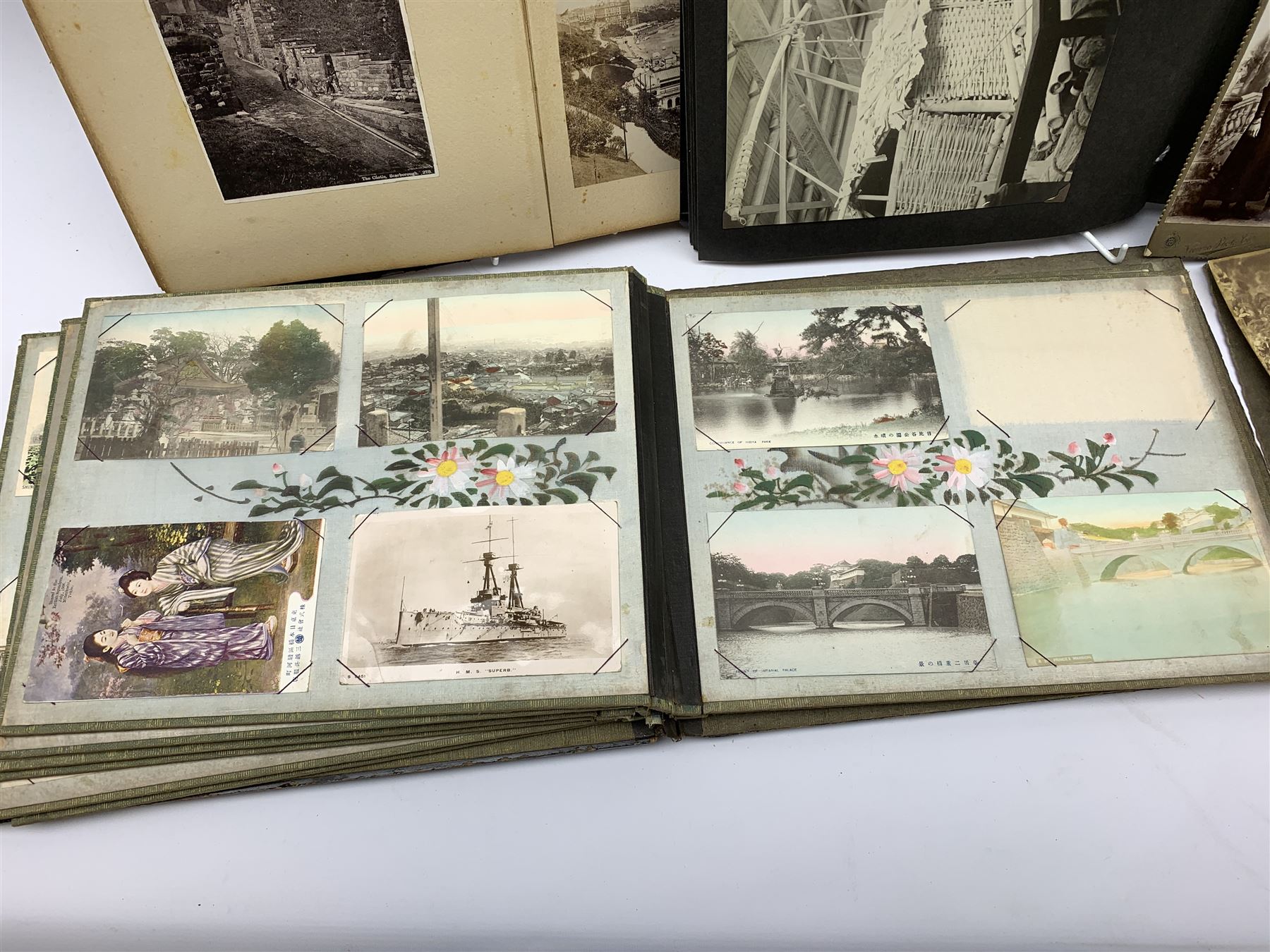 Early 20th century Japanese postcard album, the lacquered wooden covers with shibayama panel to the front, partially stocked with fifty Japanese postcards; Victorian album containing fifty-six laid-in photographs of British & Continental topographical scenes; mid-20th century album of Norwegian photographs; and quantity of Victorian cabinet photographs etc