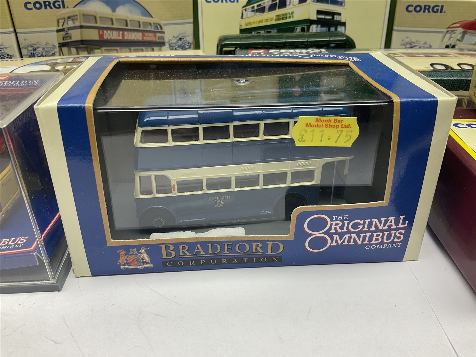 Corgi - twenty eight modern die-cast model coaches, buses and wagons to include Corgi Classics 35305, 96991, 97002, two 97108, 97208, 97267, 97335, 97871 and 98162; limited edition sets D949/26, 97107 and 97185; The Yorkshire Rider Series 91700, 91853, 91858 and 91862; all but one in original boxes or perspex display cases, most with certificates (27)