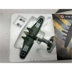 Nineteen Atlas Editions die-cast models of aircraft; to include Douglas Dakota C-47, Forke Wulf, Handley Page Halifax, De Havilland DH-98 Mosquito Mk.IV, etc and two others similar by IXO Models; all boxed (21)

