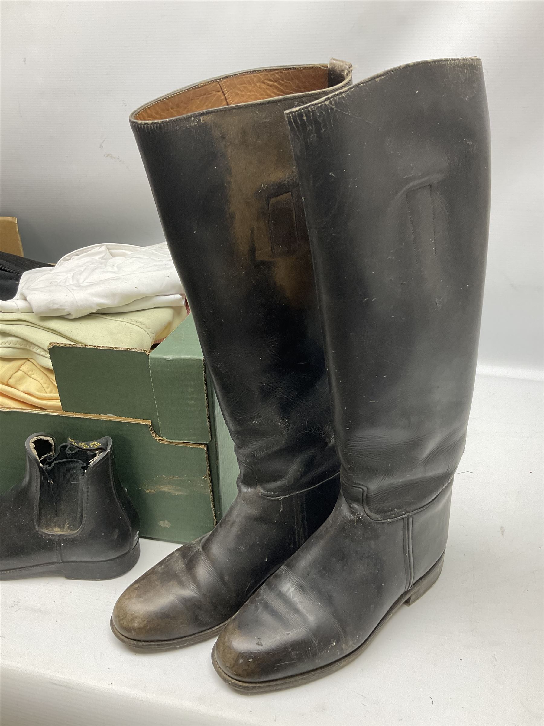 Quantity of horse tack and equipment to include Hauptner electric horse clippers, The Horseman Electric Clippers, bits, bridles, girths, rugs, jodpa boots etc  