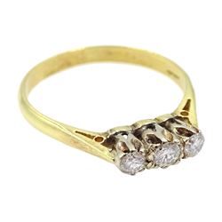 18ct gold three stone diamond ring stamped