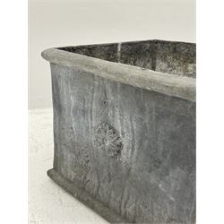 Lead jardinière planter of square form decorated with stylised flower heads motifs