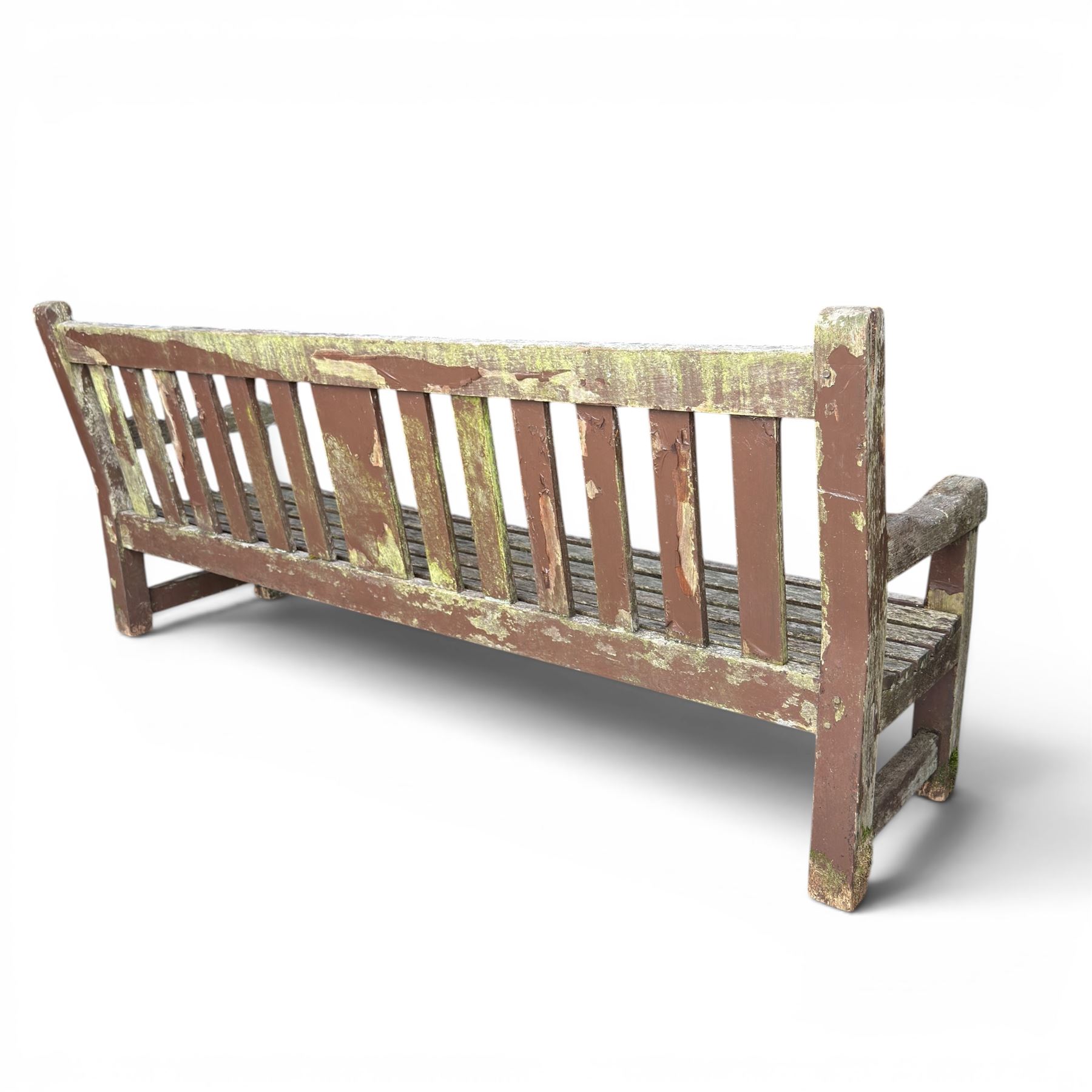 Teak garden bench with slatted back and seat on square supports in weathered which finish 
