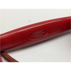 1950s Siemens Brothers red telephone with chrome rotary dial with enamel number plate and Siemens dial label, model 356, the body with base drawer below gilt logo, the handset with impressed mark PAT. 328926 PAT. SA 9/30, with red braided cord and red junction box (detatched), W15cm D18.5cm H14cm