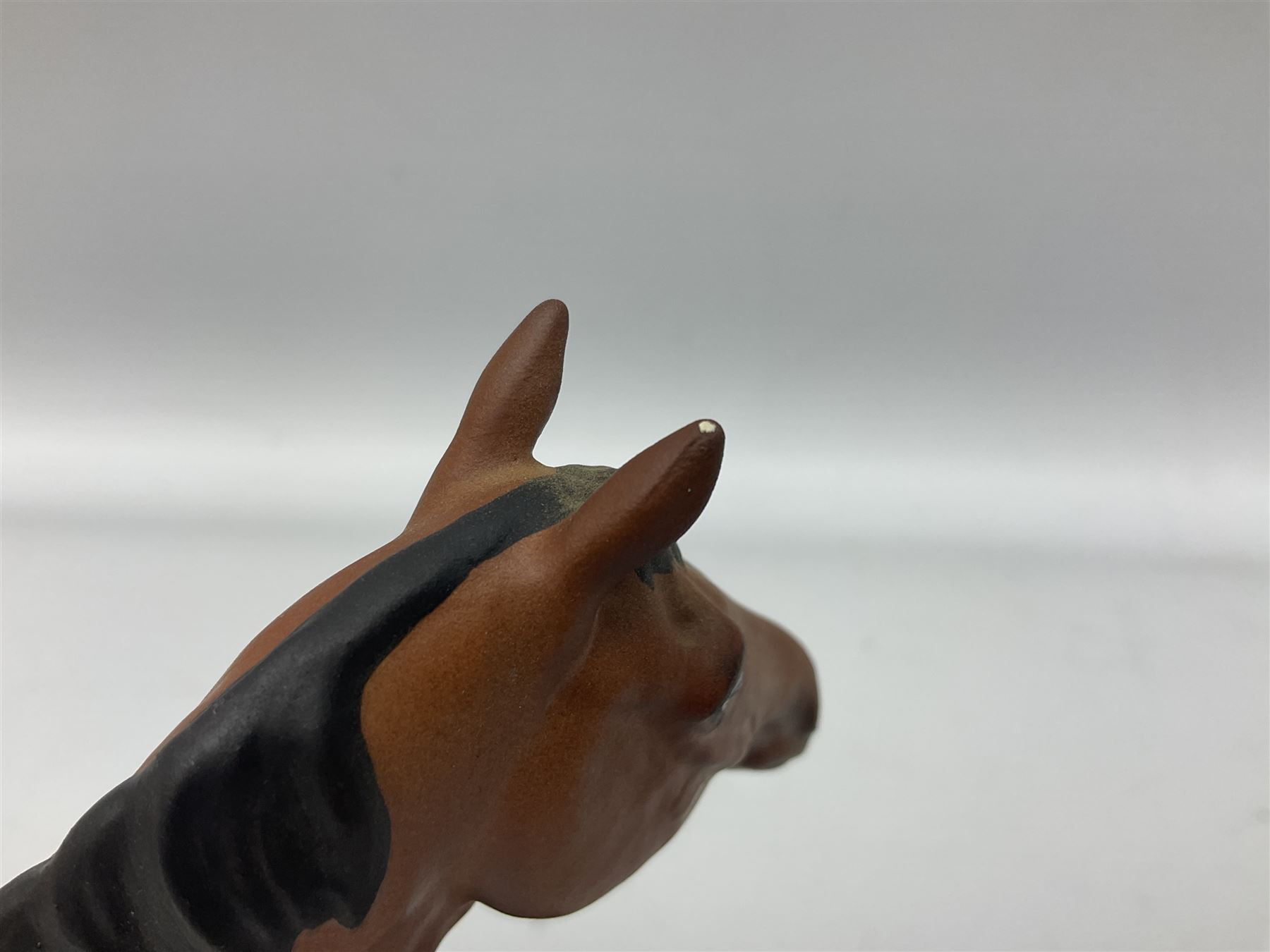 Beswick 'Mill Reef' horse figure, on a wooden plinth together with Beswick Ware horse figure 'Red Rum' on wood plinth, both with printed mark beneath