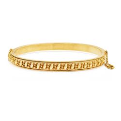 14ct gold hinged bangle, with beaded and rope twist decoration, London import mark 1989