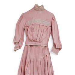 Edwardian ladies pink linen bodice and skirt, with eyelet closure and lace detailing to skirt cuffs and collar, with gathered and pleated detailing 