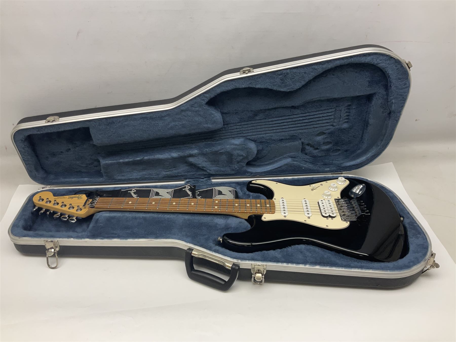 Mexican Fender Stratocaster electric guitar in black c2003 with Floyd Rose tremolo system, serial no.MZ3129600; L98cm; in Freestyle fitted case with 2006 Diamond Anniversary booklet