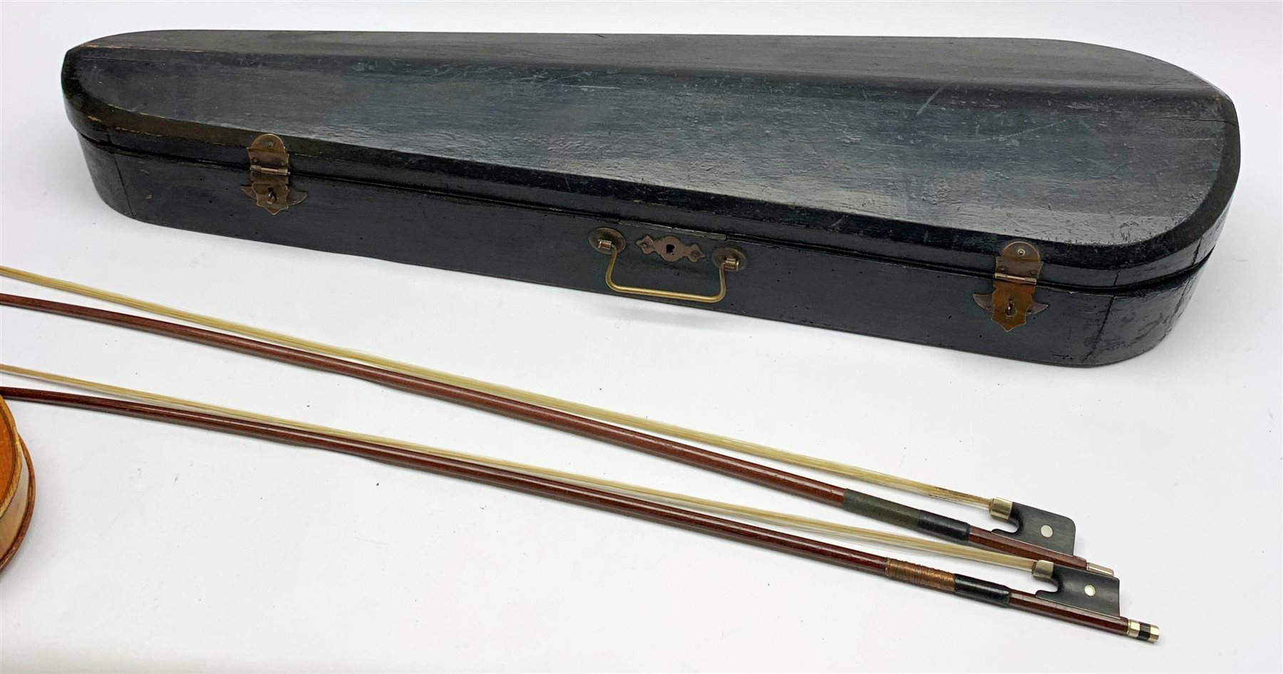  Late 19th century violin with 36cm maple back and spruce top, bears label 'Copy George Klotz Made in 1747', L59cm overall, in ebonised wooden carrying case with two bows  