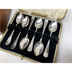 Cased set of six silver coffee spoons, hallmarked Sheffield 1933, and Walker and Hall part canteen of silver plated cutlery housed in a mahogany case 