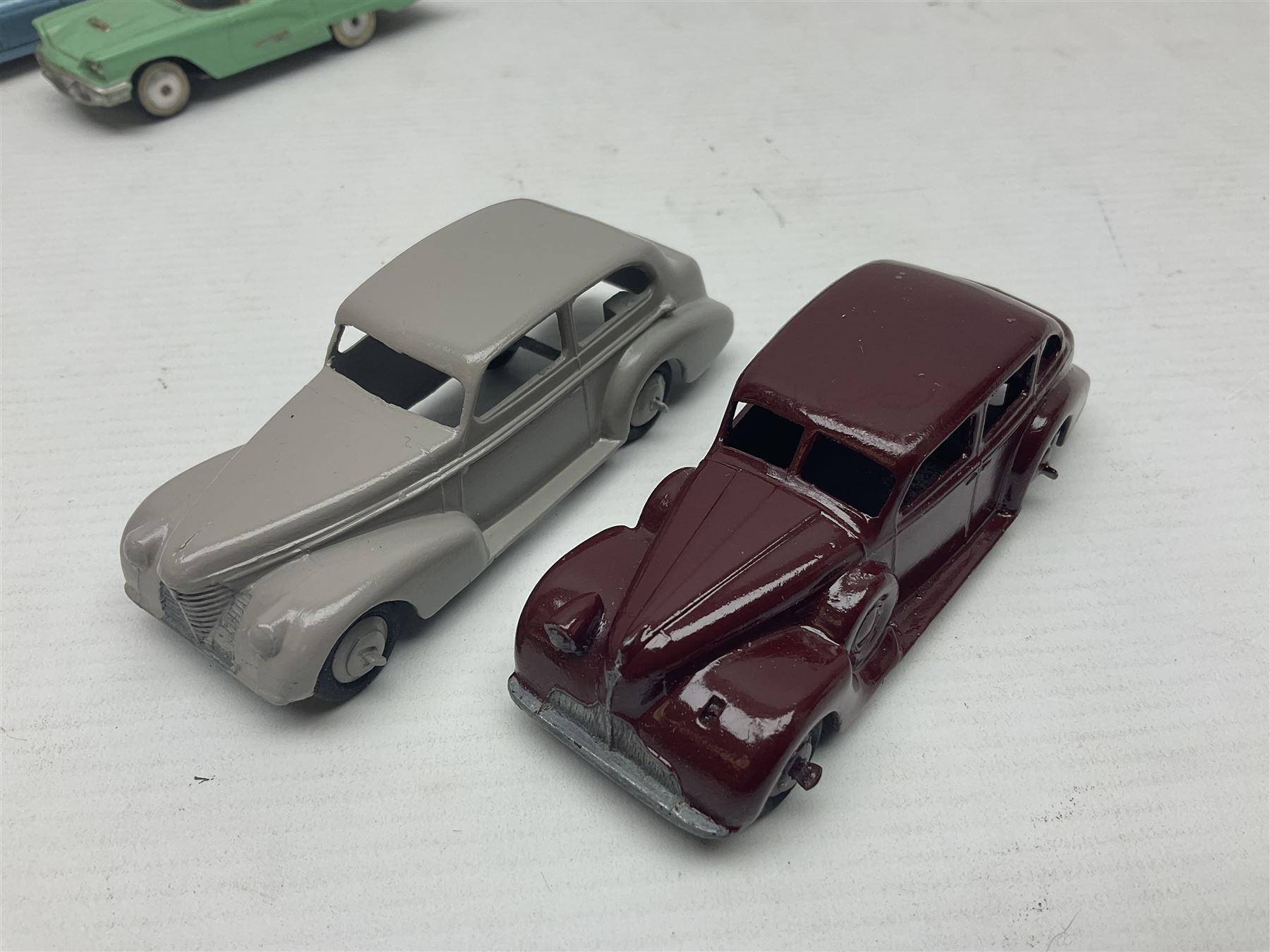 Eleven unboxed and playworn early die-cast models including Dinky Packard, Buick, two Jaguar Mark X and estate wagon, Corgi Mercedes-Benz 300S.L. Roadster, Ford Thunderbird, Citroen DS19 and Bentley Continental Sports Saloon, Spot-On Armstrong Siddeley Sapphire etc; all unboxed (11)