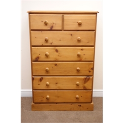  Large solid waxed pine chest, moulded top, two short and five long drawers, plinth base, W87cm, H136cm, D42cm  