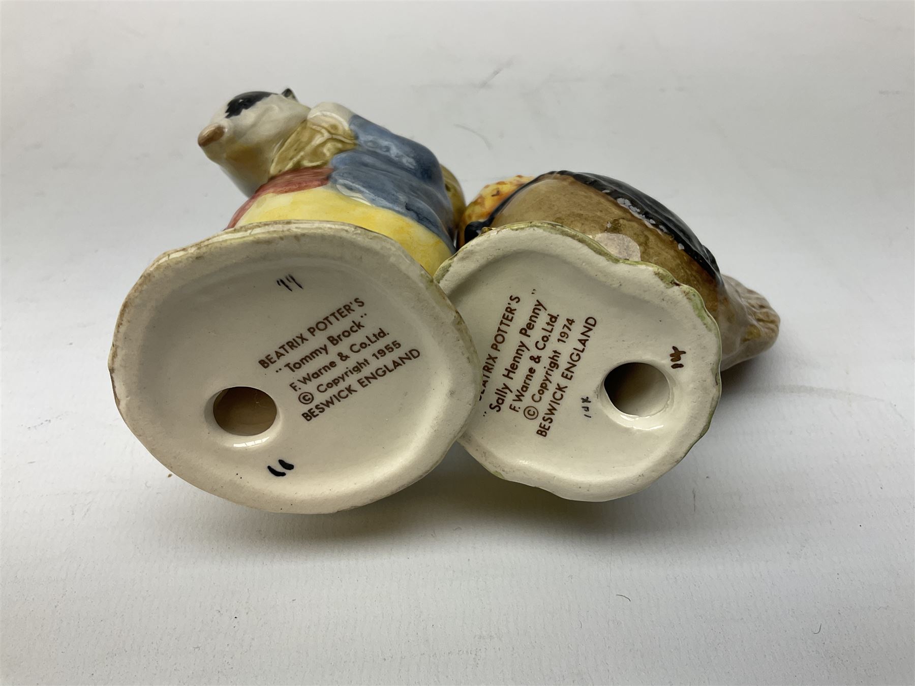 Seven Beswick Beatrix Potter figures, comprising Sir Isaac Newton, Mr Jackson, Tommy Brock, Pickles, Mr Jeremy Fisher, Mr Alderman Ptolemy and Sally Henny Penny, all with printed mark beneath  