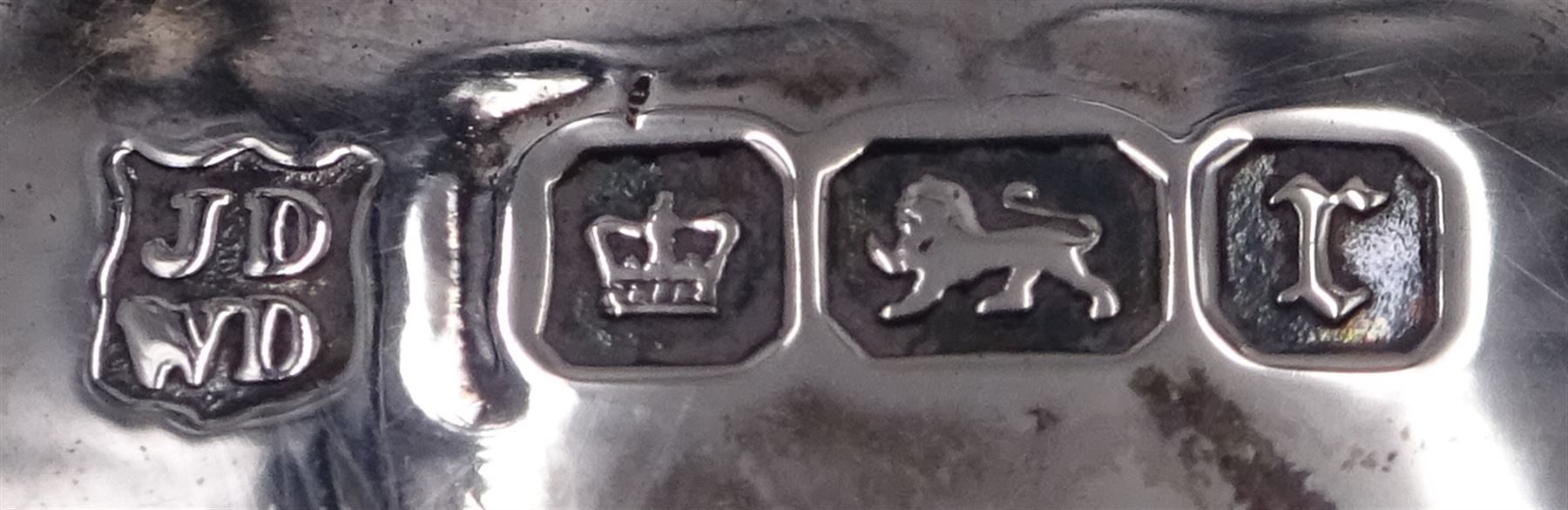 Set of four Edwardian silver open salts, of circular form, each with later personal engraving to scalloped rim and upon three pad feet, together with four matching silver salt spoons, hallmarked James Deakin & Sons, Sheffield 1909, in velvet and silk lined fitted case     