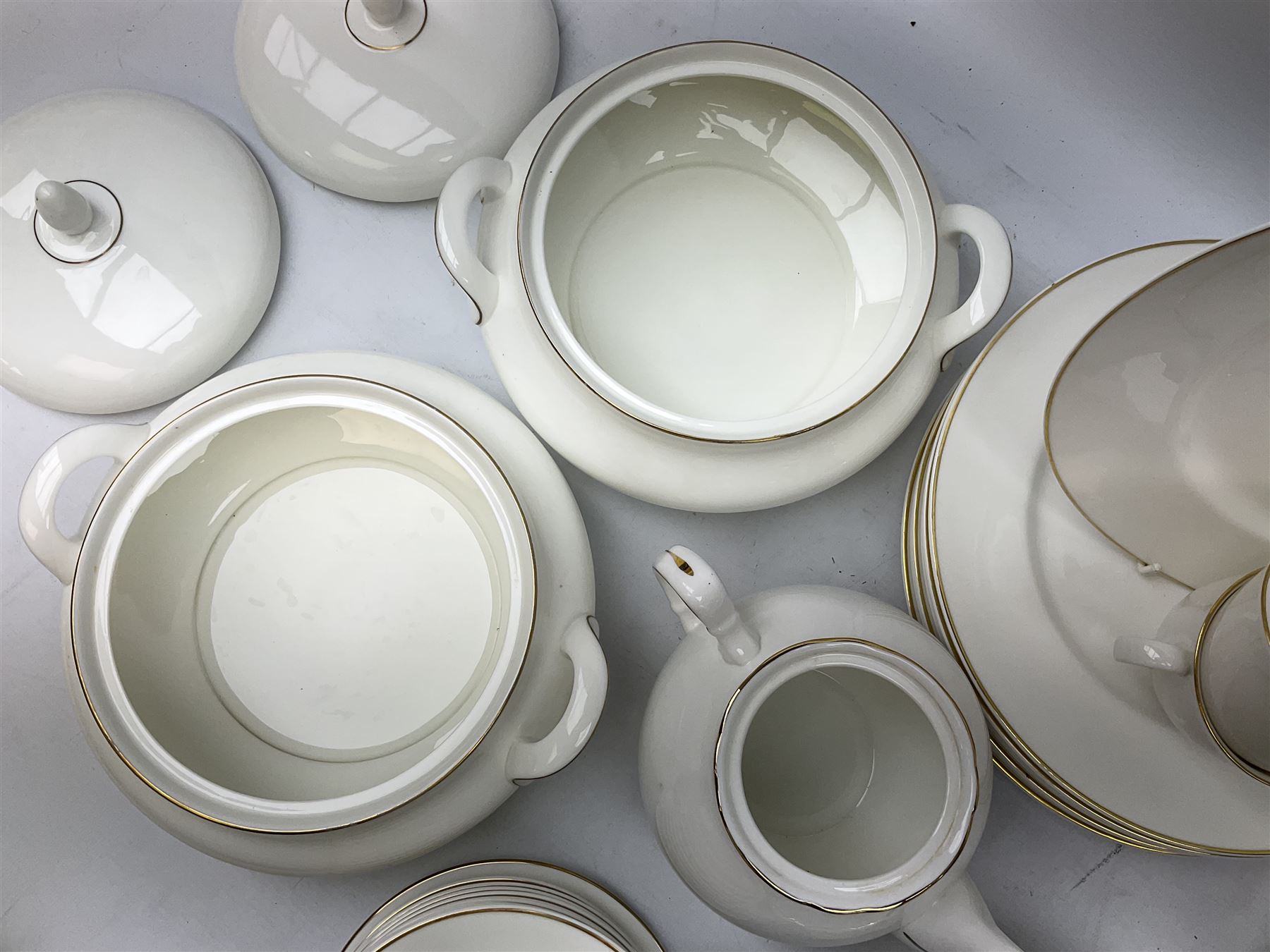 Royal Doulton Imagination pattern part dinner service, comprising eight dinner plates, eight side plates, eight dessert plates, eight bowls and nine cups and saucers, together with Royal Doulton Fortune pattern, five covered tureens,  jug and stand and other similar