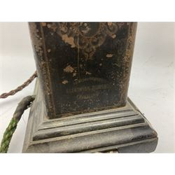 Early 20th century Danish desk telephone inscribed The Ericsson Bell Telephone Co. Glasgow to one side and Aktieselskabet Electrisk Bureau Kristiansand to the other, ebonised wooden top with handset on brass cradle. black japanned tin centre section bearing Hull Corporation Telephones Department crest, side cranking handle and ebonised wooden base H30cm  