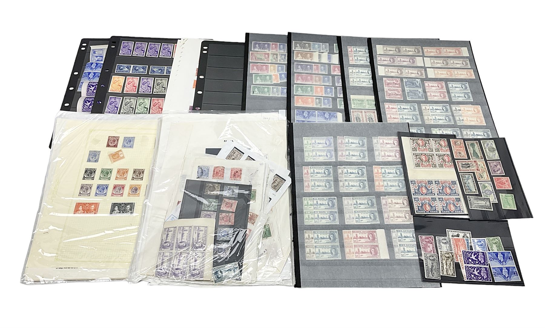 Stamps including various King George VI 8th June 1946 Victory, various 1923-1948 Silver Wedding, Malaya, Cyprus, China overprints on Hong Kong etc, housed on stockbook/album pages 