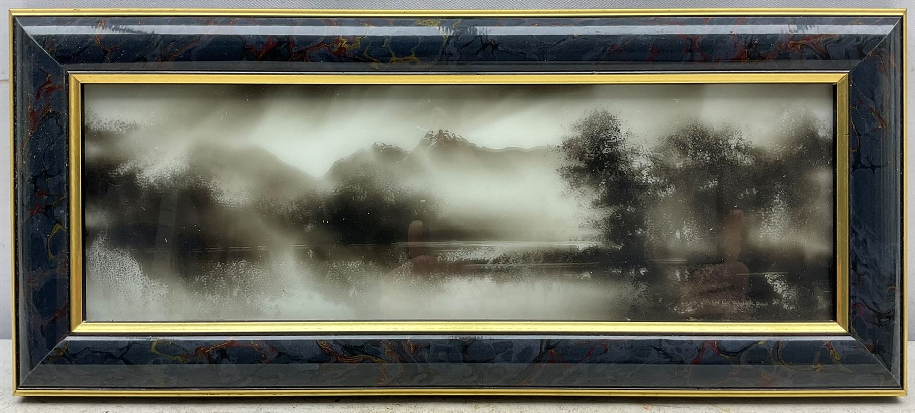 Maurice William Crawshaw (British 1947-): Lakeland Landscape, candle smoke picture signed and dated '93, 10cm x 31cm