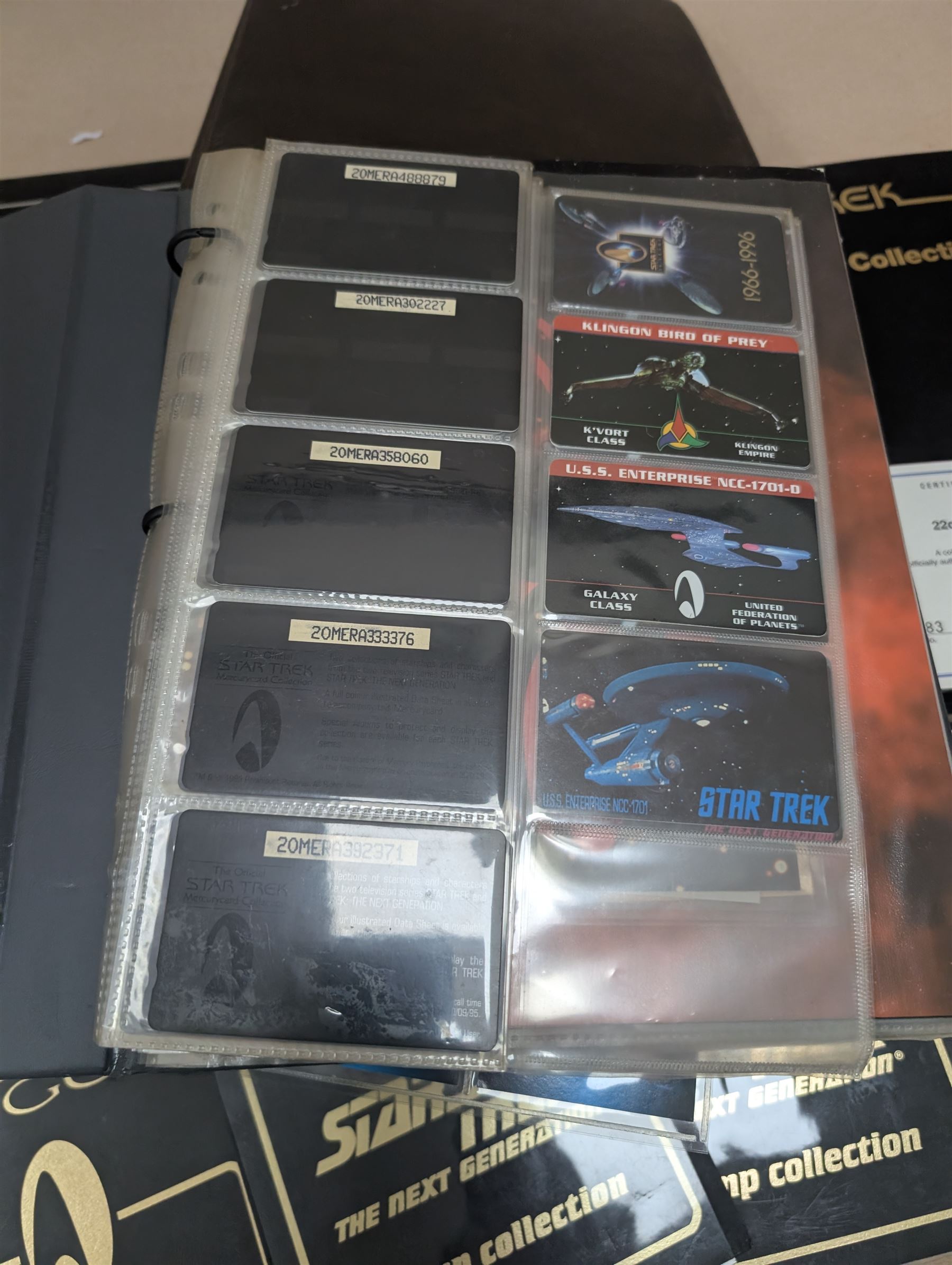 Star Trek collectables, including Danbury Mint '22ct Gold Card Collection', PCS Stamps and Coins Official US Postage Celebrating The Original Star Trek Series, Star Trek St Vincent and Grenadines first day cover collection, four stamp sets and a framed set of similar stamps, commemorative coins, Star Trek The Experience Las Vegas coin, three commemorative 'gold stamps' and three albums of collectors cards and telephone cards