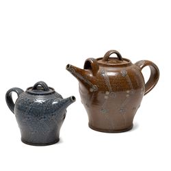 Gus Mableson - two studio pottery teapots, the larger example with a repeating floral patt...