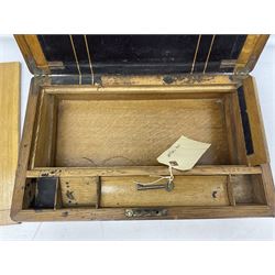 Oak writing slope, the hinged lid with inlaid brass vacant cartouche opening to reveal black gilt tooled leather, with key, L40cm