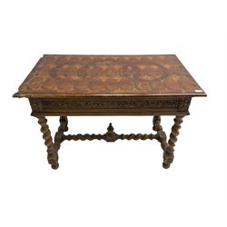 Early 20th century carved oak side table, the rectangular top with cross section inlay, frieze carved with foliate decoration, raised on spiral turned supports united by barley-twist stretcher with finial