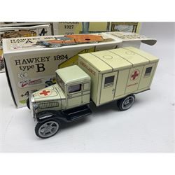 Kovap - eleven tinplate models to include Tractor and Trailer, Road Roller 1927, Moving Moneybox 1924, Hawkeye type B 1924, Boy on a Tricycle; all in original boxes 