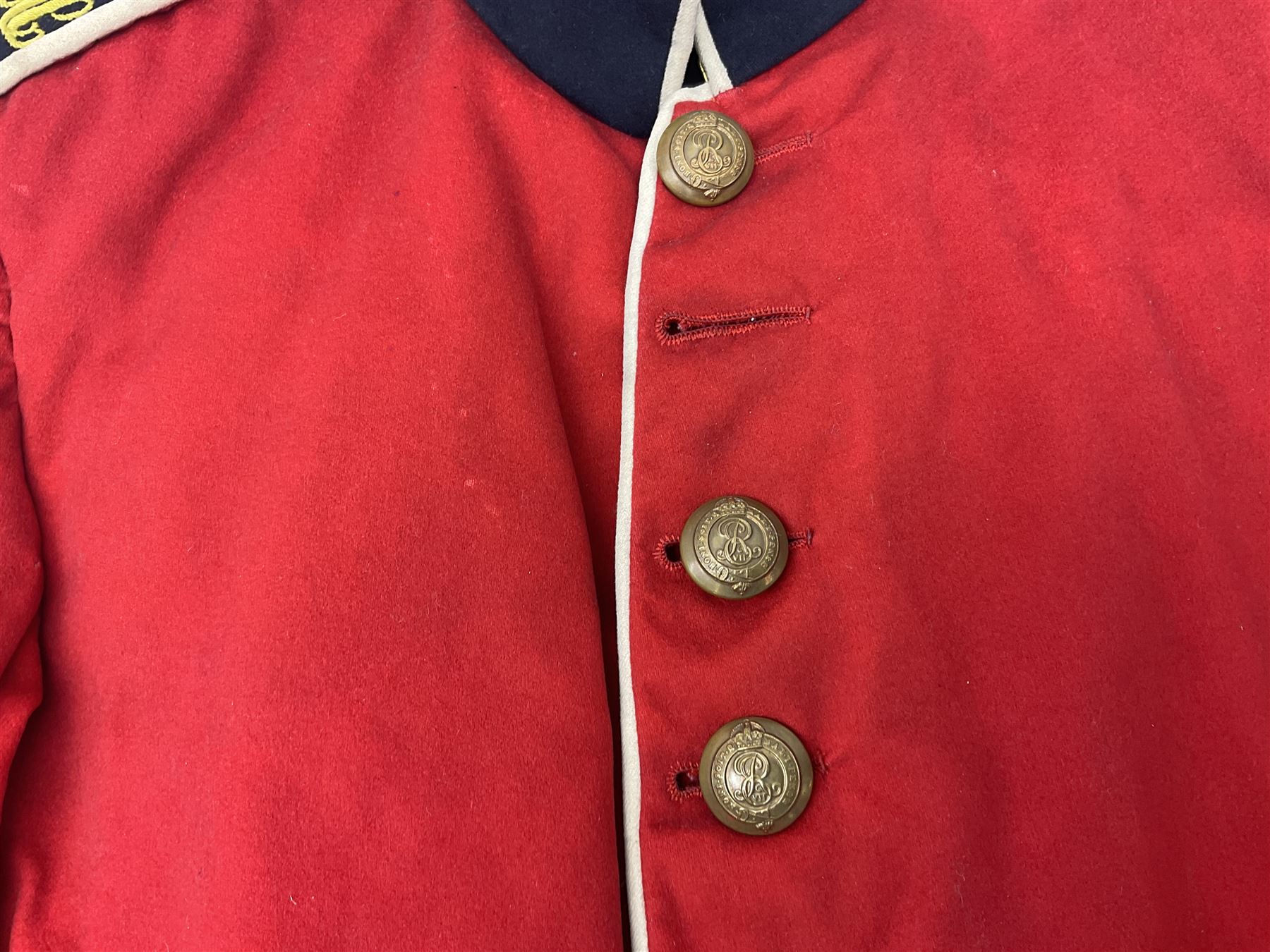 Royal Military College Sandhurst parade uniform with peaked cap and two-piece mess dress, all bearing historic manuscript labels for J.E.A. Baldwin, possibly Air Marshal Sir John Eustace Arthur Baldwin (1892-1975) who served in the British Army 1910-18 & 1944-58 and in the RAF 1918-44.