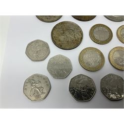 Queen Elizabeth II commemorative coins, including three Isle of Man 1970 crown coins, two further UK 1965 and 1970 crowns, three 2017 ‘Benjamin Bunny’ fifty pence pieces, two 1999 ‘Rugby World Cup’ two pound coins, Isle of Man 1999 ‘Phillip McCallen’ fifty pence piece etc