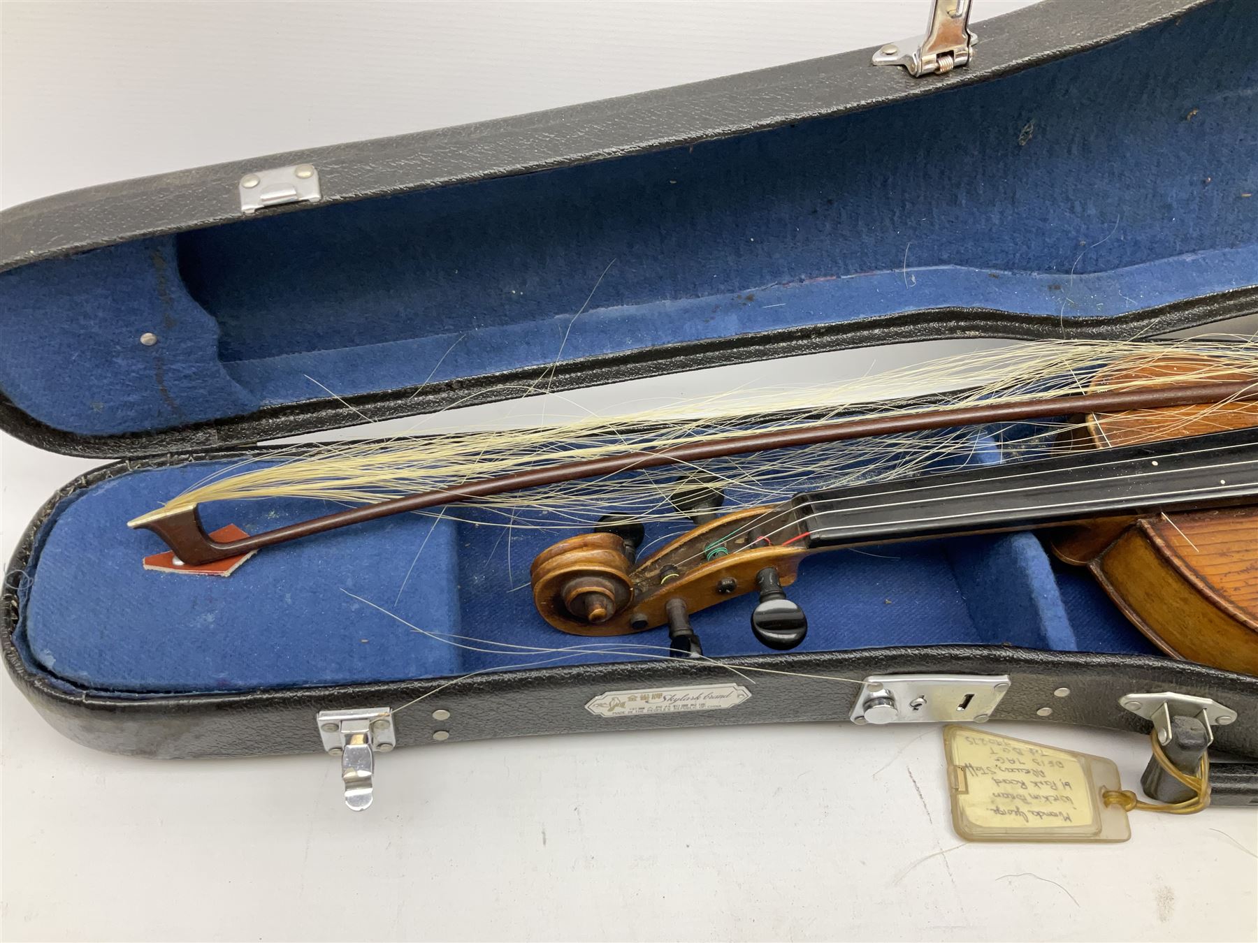 Two cased Skylark violins with bows, largest violin L59cm 