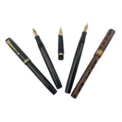 Four fountain pens each with 14ct gold nibs, together with another 14ct nib