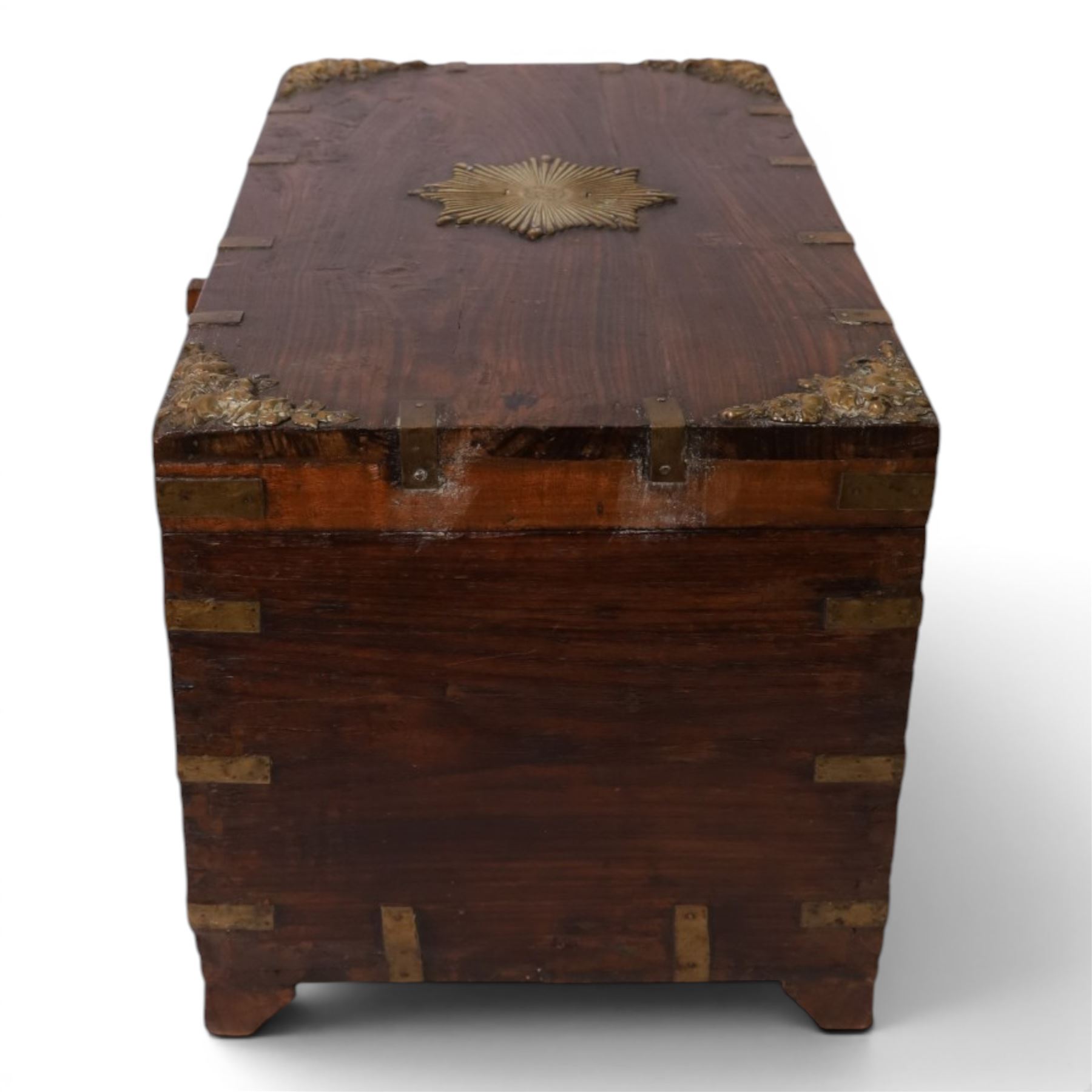 Anglo Indian brass bound chest, the hinged lid with central brass star and floral motifs to the corners, opening to reveal a fitted tray, H30cm, D30cm  
