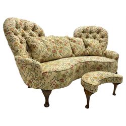 Victorian design hardwood-framed double back settee, upholstered in buttoned floral pattern fabric, curved back over serpentine seat, on cabriole feet, with matching scatter cushions (W182cm, H94cm, D86cm); together with crescent-shaped footstool with cabriole feet (W55cm)