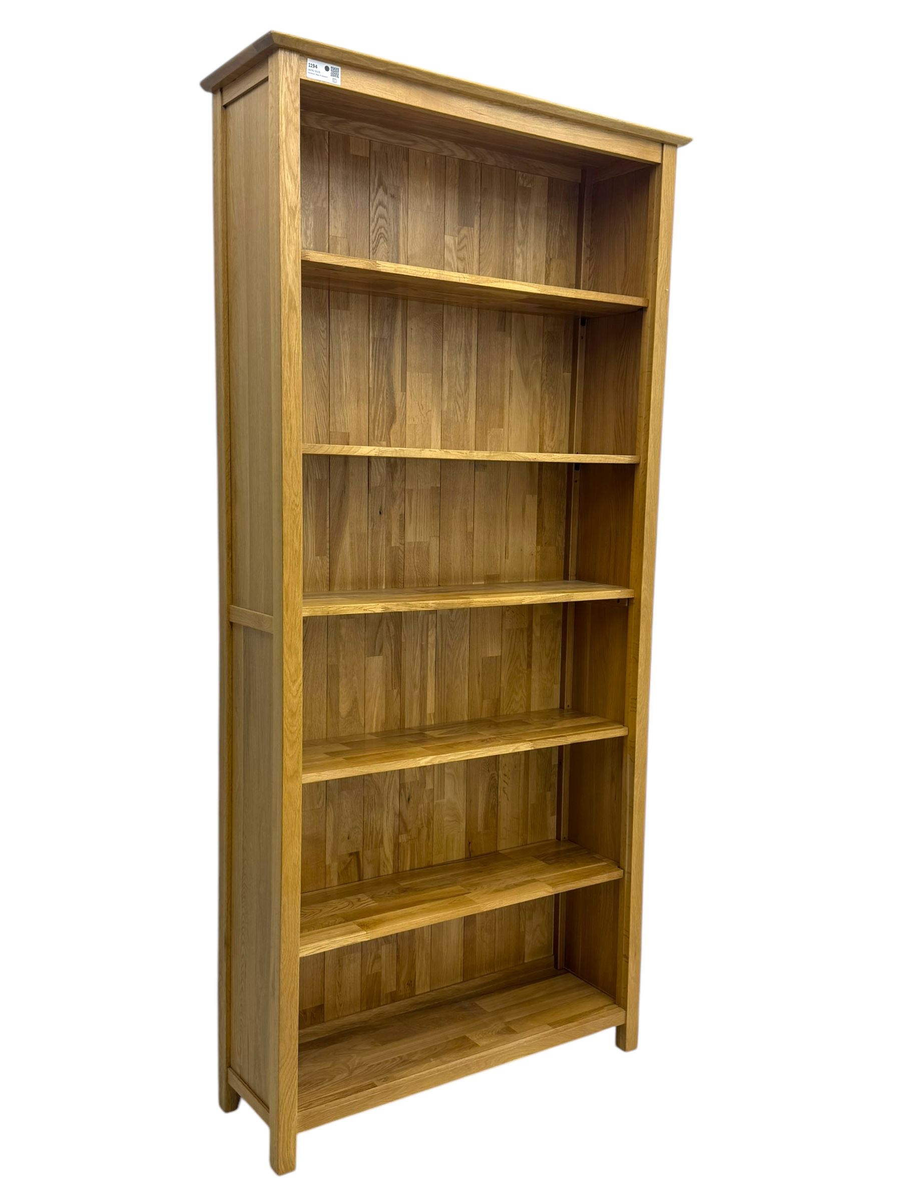 Light oak open bookcase, five adjustable shelves  