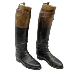 Pair of vintage gentleman's black leather calf length riding boots with brown leather banding and wooden trees, boot H49cm