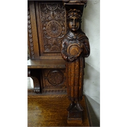  19th century continental oak bevel edged mirror back sideboard, projecting cornice, carved frieze with man and woman figural supports, two ogee front drawers and two cupboard doors depicting various tavern scenes, turned bun feet, W163cm, H216cm, D59cm  