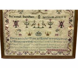 George III sampler, worked by  Susannah Sumpner, and dated 1800 lower right, depicting various motifs including crest, flowering urns, birds, and crows, between religious verse, within flowering vine border, framed and glazed, overall H44.5cm W37cm