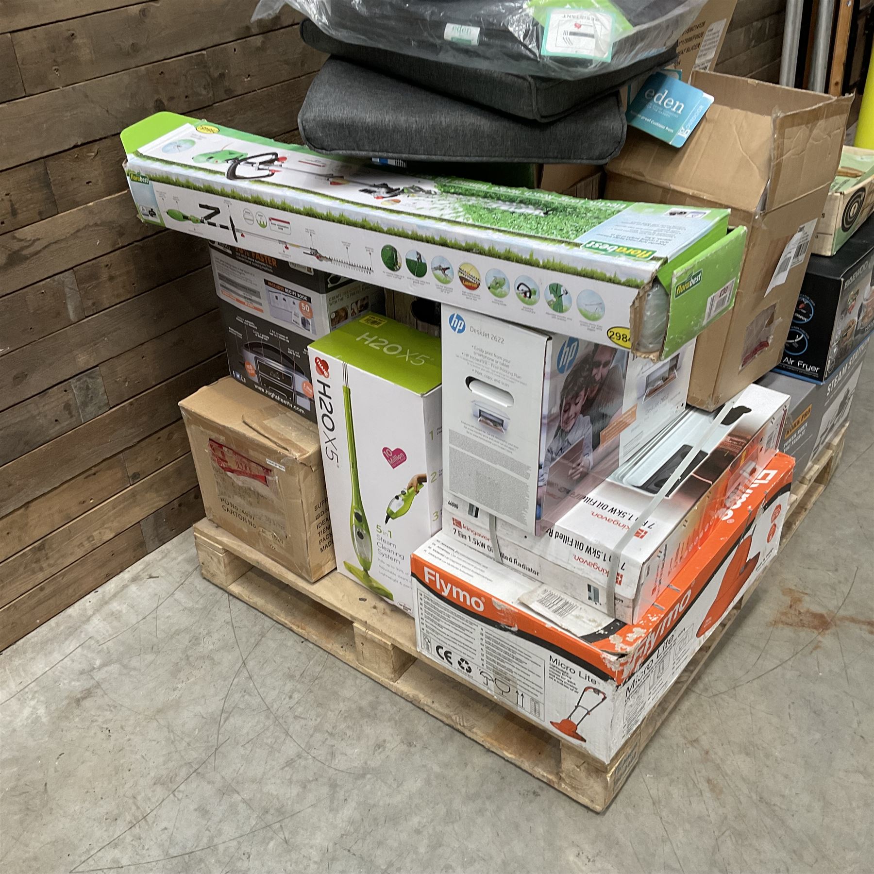 Collection of boxed items including a Flymo Micro Lite lawn mower, HP printer, Daewoo Halogen Air Fryer, an oil filled radiator etc