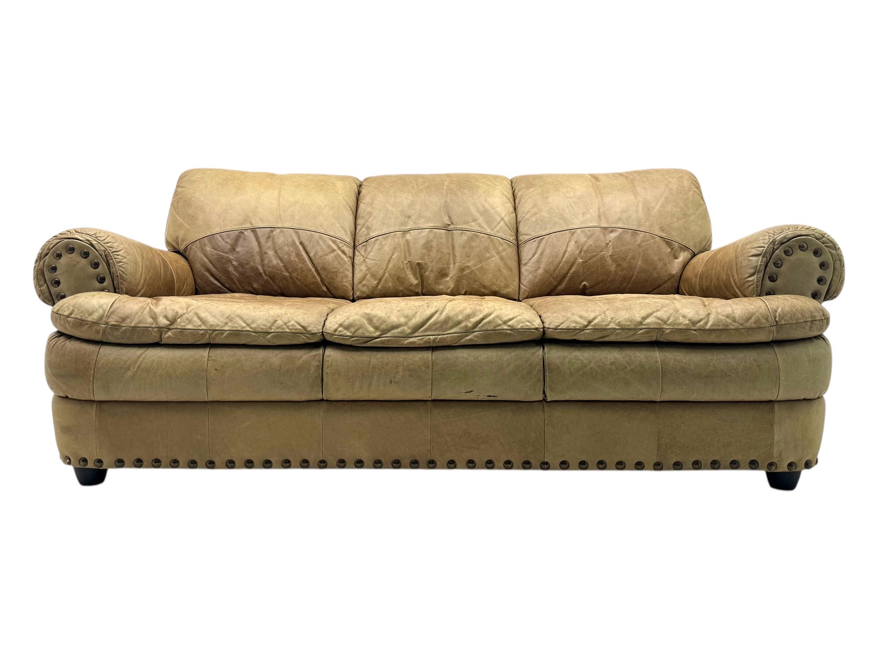 Contemporary three-seat sofa, upholstered in stitched brown leather with brass studwork decoration, rolled back and arms, raised on turned supports
