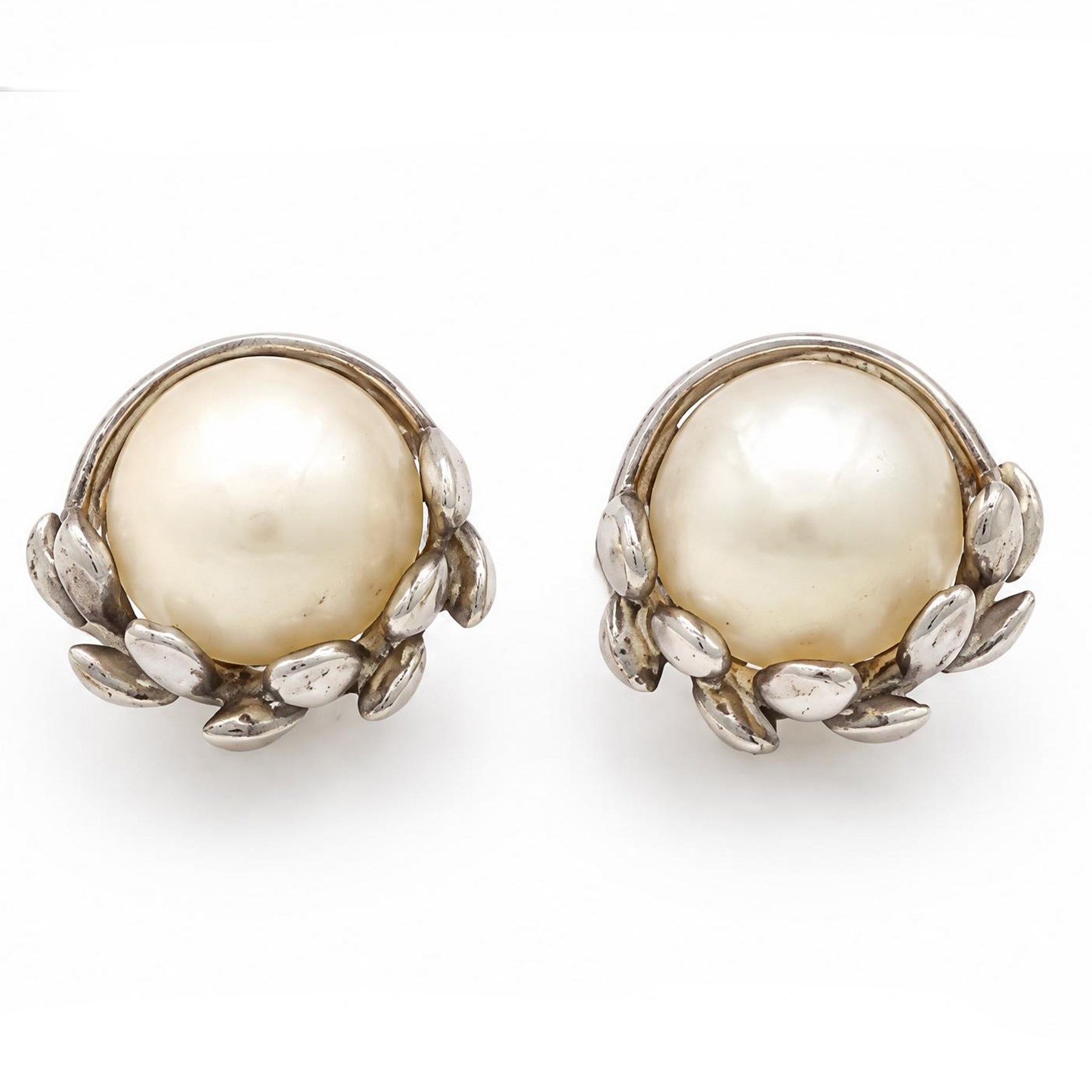 Tiffany & Co. silver jewellery - four pairs of stud earrings including two pearl set, one by Paloma Picasso, cross pendant necklace and a bead necklace chain, all stamped