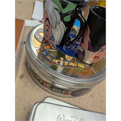Collection of Disney memorabilia and ephemera, including Walt Disney Treasures DVD, two Disney Villains mugs, enamel pins, Mickey Mouse D23 fan club pack, Disney Twenty-Three magazines, Sketches magazines, etc