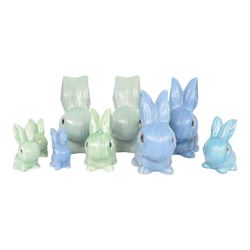Nine Sylvac rabbits, including models 1028, 990, 1026 etc, in blue and green, largest H25cm  