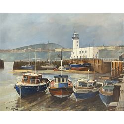 Don Micklethwaite (British 1936-): Scarborough Harbour with lighthouse, oil on board signed 39cm x 50cm